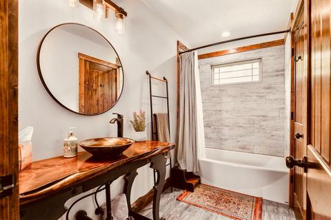 Full bathroom with a vanity and walk-in shower at the James River Cabin
