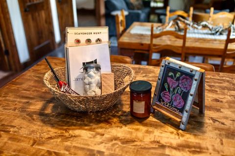 Close-up of the scavenger hunt cards and treat jar provided for guests