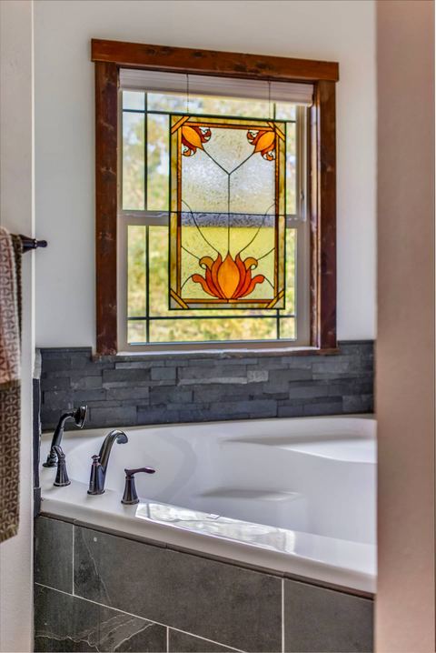 Tiled shower detail in the cabin’s second bathroom