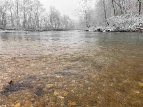 The James River in winter, mist rising off the water through bare trees