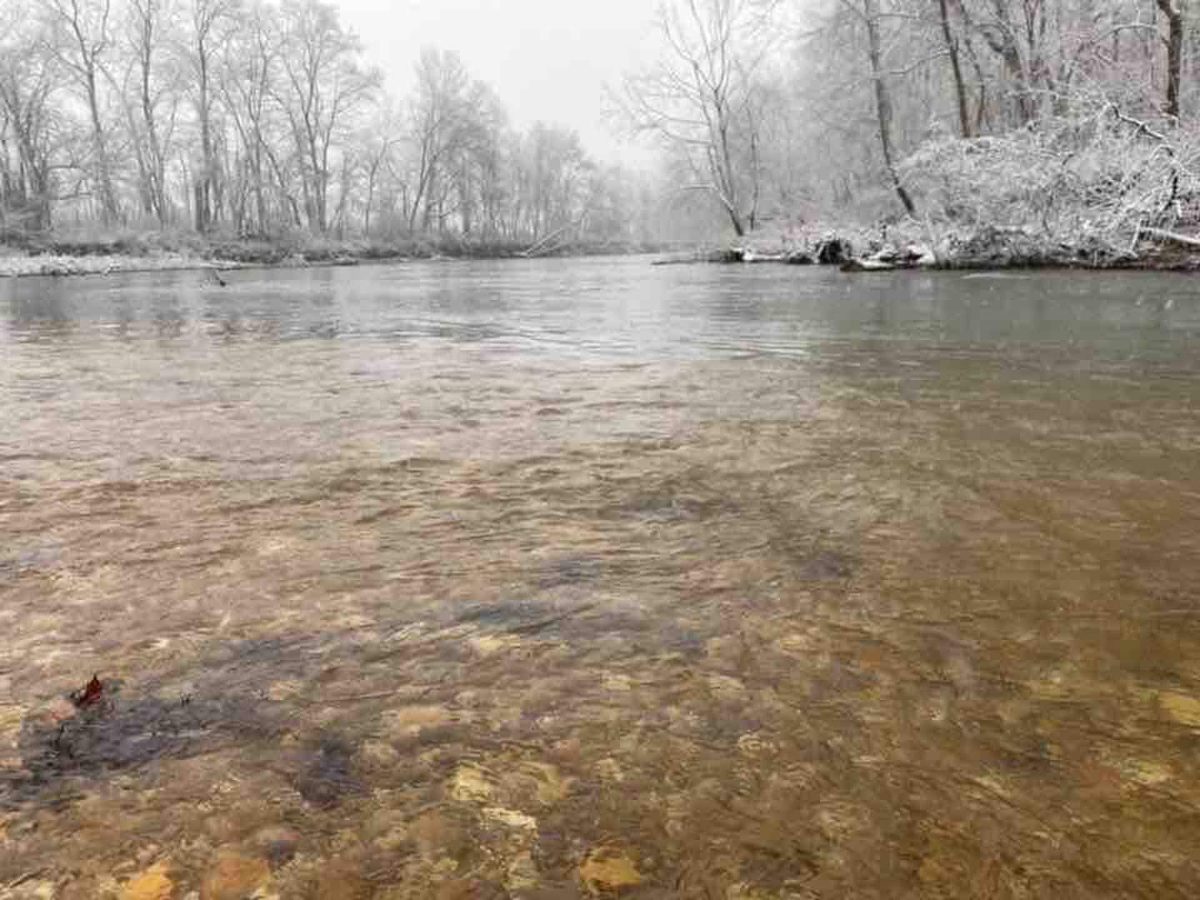 The James River in winter, mist rising off the water through bare trees