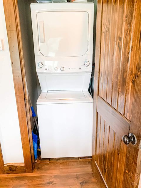 Stacked washer and dryer available for guests during their stay
